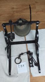 schoolbel - trekbel in brons, Ophalen