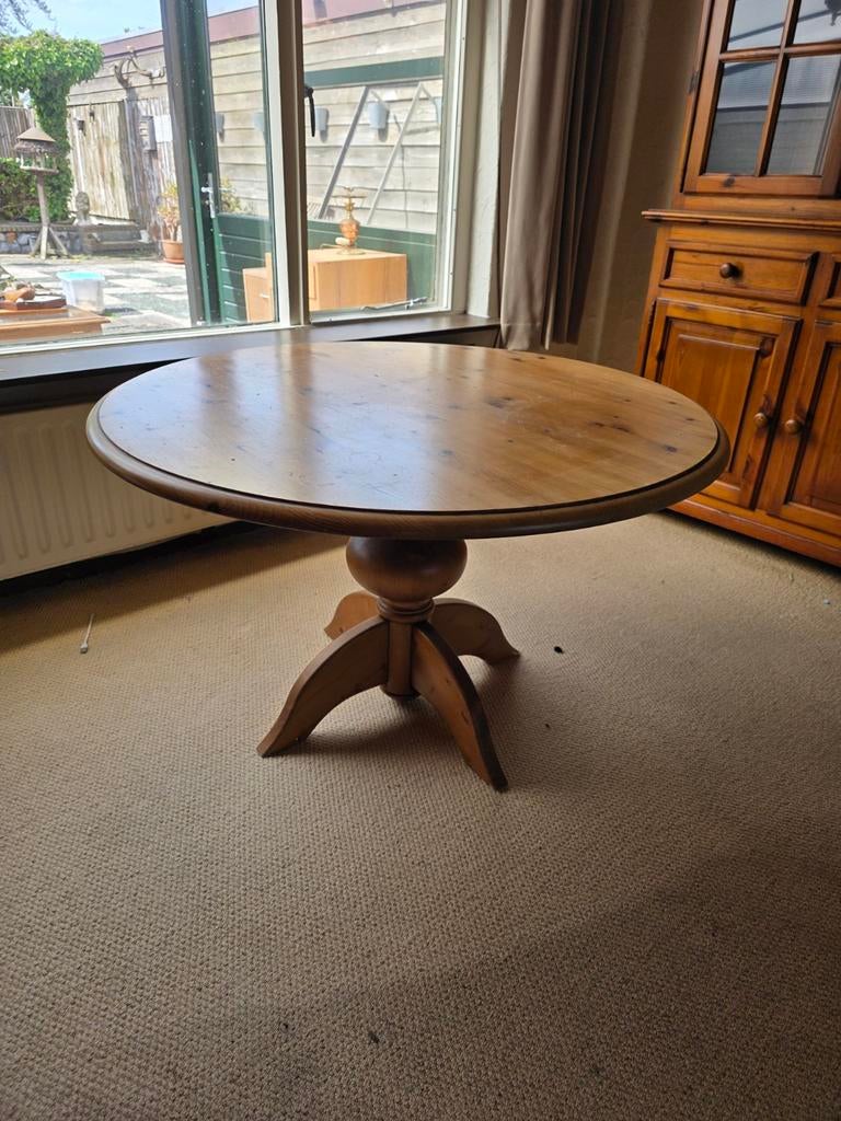 Ronde houten eettafel, Ophalen