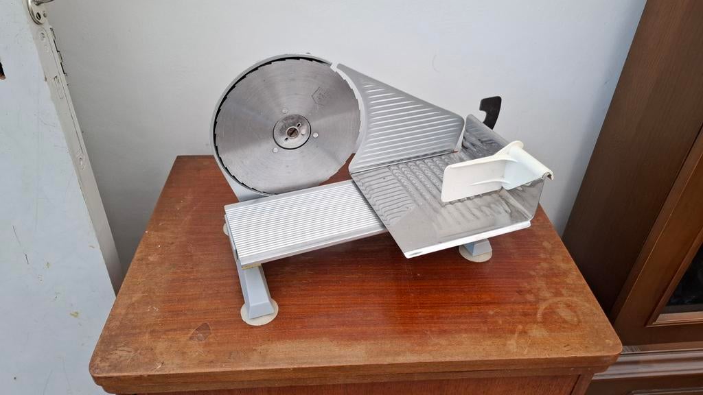 Snijmachine, Ophalen