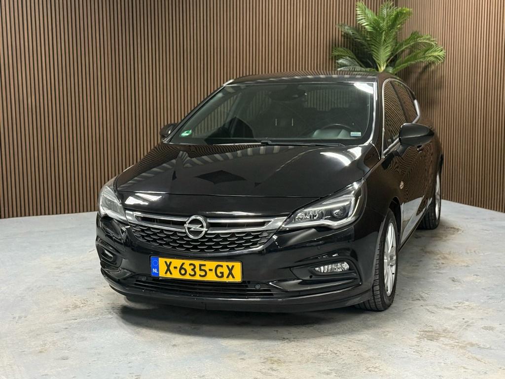 Opel Astra 1.4 Business+ (bj 2017, automaat), Auto's, Gebruikt, Euro 6, 150 pk, 620 kg