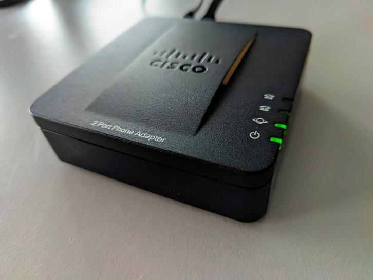 Cisco SPA 112 2 poort VOIP adapter, Telecommunicatie, Datacommunicatie en VoIP, Gebruikt, Toebehoren, Ophalen of Verzenden