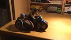 Motor met zijspan van blik, Verzenden