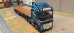 Volvo FH met  4 assige open trailer wsi, Hobby en Vrije tijd, Modelauto's | 1:50, Ophalen of Verzenden, Zo goed als nieuw, Bus of Vrachtwagen