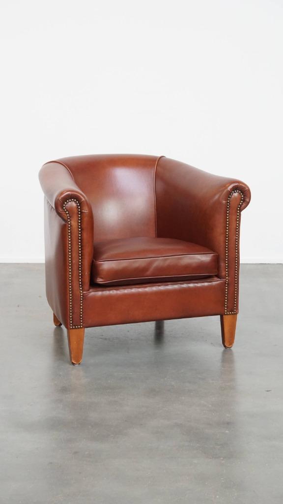 Luxe cognac kleurige clubfauteuil gemaakt van rundleer, Huis en Inrichting, Fauteuils, Gebruikt, Leer, 75 tot 100 cm, 75 tot 100 cm