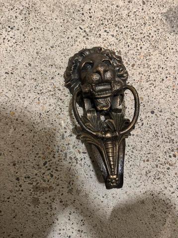 Gietijzeren deurklopper leeuw beschikbaar voor biedingen