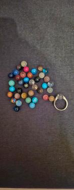 Melano Ring met Cateye Balletjes, Ophalen of Verzenden