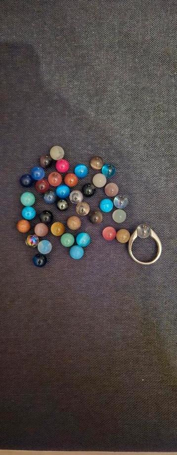 Melano Ring met Cateye Balletjes beschikbaar voor biedingen