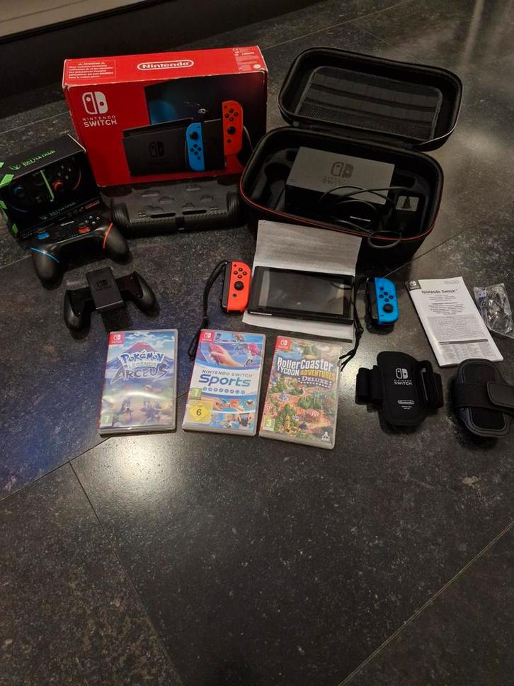 Nintendo Switch met 3 games en 2 game controllers, Spelcomputers en Games, Spelcomputers | Nintendo Switch, Zo goed als nieuw