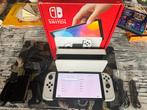 Nintendo Switch OLED + Accessoires, Spelcomputers en Games, Games | Nintendo Switch, Avontuur en Actie, Gebruikt, 1 speler, Eén computer