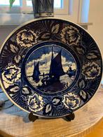 Delfts blauw bord, Ophalen