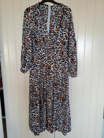 Lichtblauwe jurk met panterprint van H&M, mt.42 beschikbaar voor biedingen