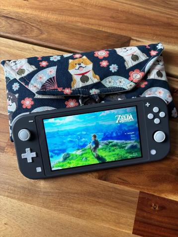 Nintendo Switch Lite grijs met games beschikbaar voor biedingen