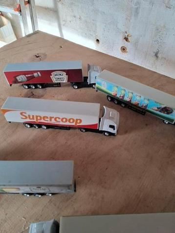 11 Miniatuur trucks met aanhanger vol reclame.  beschikbaar voor biedingen