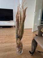 Vaas met droogbloemen en verlichting, Ophalen