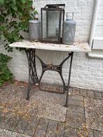 Oud naaimachine met onderstel, Ophalen