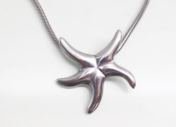 Grote zilveren hanger zeester aan collier  beschikbaar voor biedingen