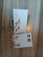 Goud kleurige oorbellen nog nooit gedragen, Overige materialen, Hangers, Nieuw, Ophalen of Verzenden