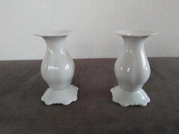 Twee porseleinen Marco Polo kandelaren  beschikbaar voor biedingen