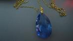 Nieuw goud vergulde ketting met blauwe kristal steen, Nieuw, Ophalen of Verzenden, Goud, Overige materialen