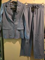 Nieuw Nous travel pak lichtblauw M, Ophalen of Verzenden, Nieuw, Blauw