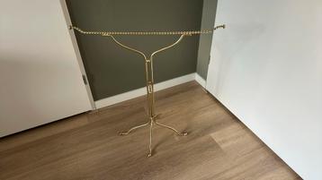 Kledingrek goud/brons/koper kleurig. beschikbaar voor biedingen