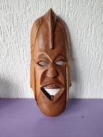 Houten tiki masker, Ophalen