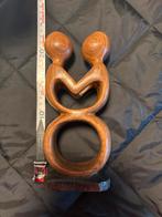 Houten beeldje, Ophalen