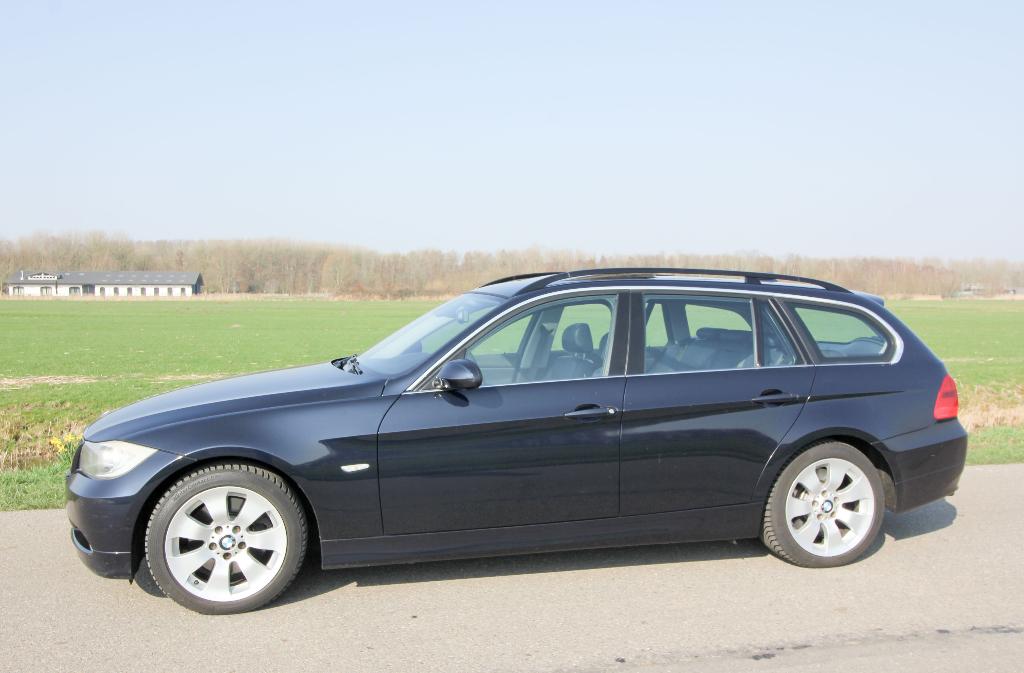 BMW 3-Serie 325xi Touring Automaat E91 6-cil 2006 Blauw Leer, Automaat, Blauw, Vierwielaandrijving, 93 €/maand