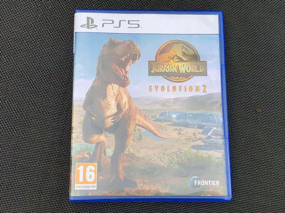 Jurassic World Evolution 2 PS5 - Zo goed als nieuw, 1 speler, Ophalen of Verzenden, Zo goed als nieuw, Vanaf 12 jaar