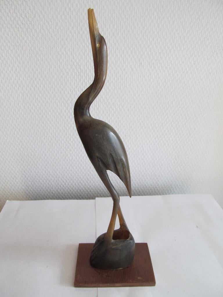 Handgestoken reiger van hoorn., Ophalen