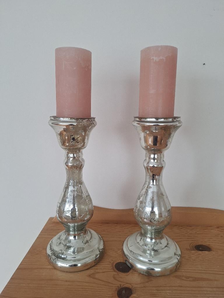 Armeluiszilveren kaarsenstandaard, Ophalen