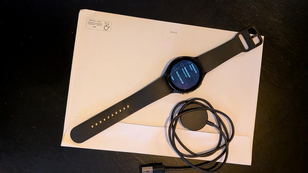 Samsung Galaxy Watch 4 - Zwart, Zo goed als nieuw, Zwart, GPS, Ophalen of Verzenden, Zo goed als nieuw