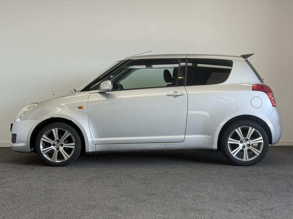 Suzuki Swift 1.3 Comfort Airco! Export price!, Auto's, Stof, Gebruikt, 31 €/maand, Swift
