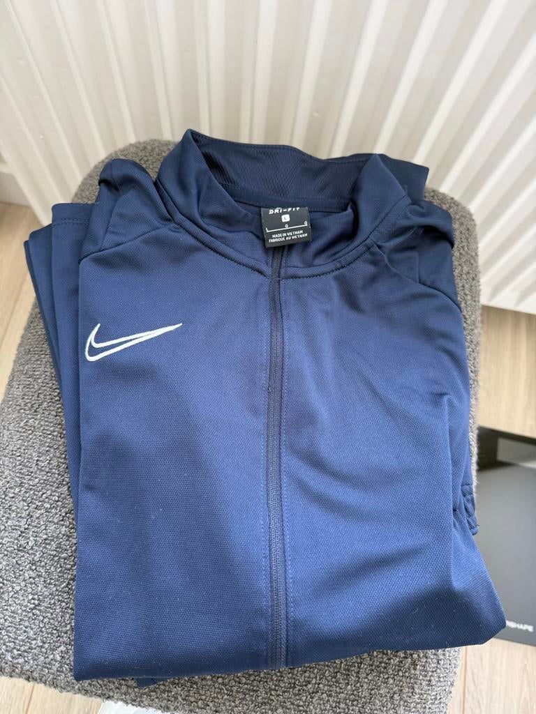 Nike trainingspak - Zo goed als nieuw, Maat 52/54 (L), Blauw, Ophalen of Verzenden, Zo goed als nieuw