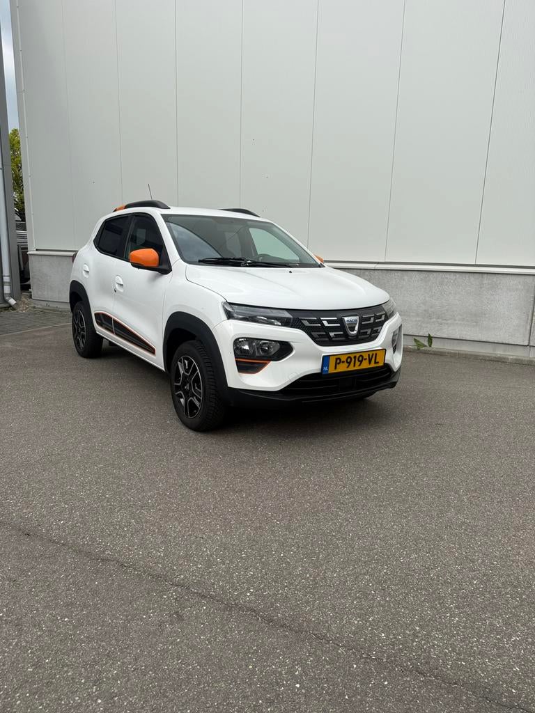 Dacia Spring 100% Electric Comfort Plus met nieuwe APK !, Zwart, 38 min, 4 stoelen, Wit