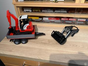 Bruder  aanhanger  graafmachine  en laadschop  voor  trekker beschikbaar voor biedingen