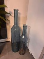 2 blauwe fles vazen (100 en 70 cm hoog), Ophalen