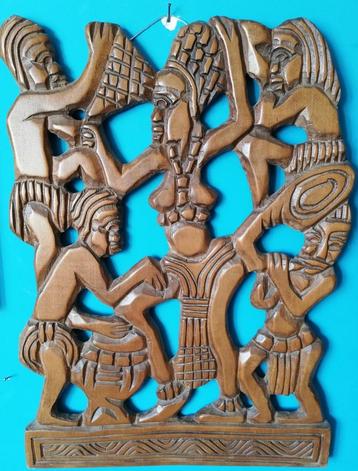 Houtsnijwerk. Wandplaquette. Afrika. 59/43 cm. Sign.  beschikbaar voor biedingen