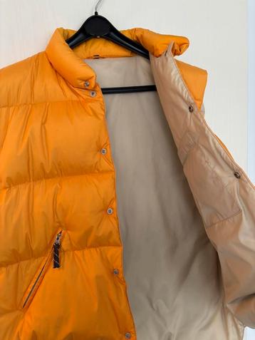 Zacht oranje dames bodywarmer, dons, mt L zgan beschikbaar voor biedingen