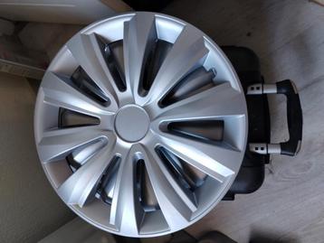 Nieuwe wieldoppen 14 inch - 4 stuks beschikbaar voor biedingen