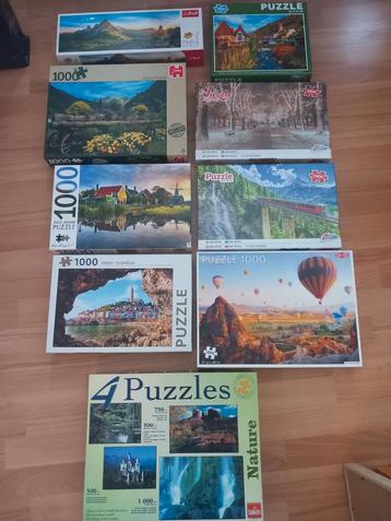 Partijtje verschillende puzzels van 1000 stukjes beschikbaar voor biedingen