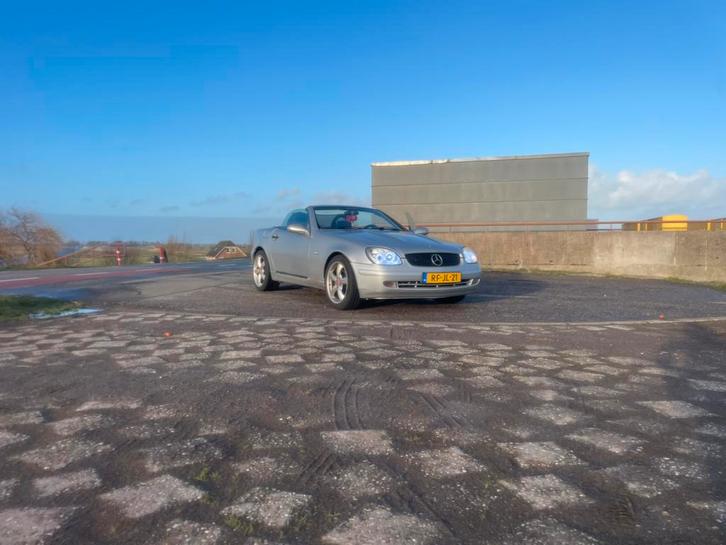 Mercedes-Benz SLK 2.3 Slk230 Kompr Roadster 1997 Grijs, Auto's, Mercedes-Benz, SLK, Lederen bekleding, Benzine, Cabriolet, Handgeschakeld