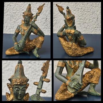 Bronzen sculptuur van een muzikant,  deels verguld  beschikbaar voor biedingen