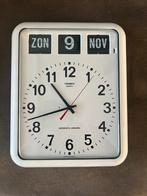 Twemco kalender klok, Ophalen of Verzenden, Zo goed als nieuw, Wandklok
