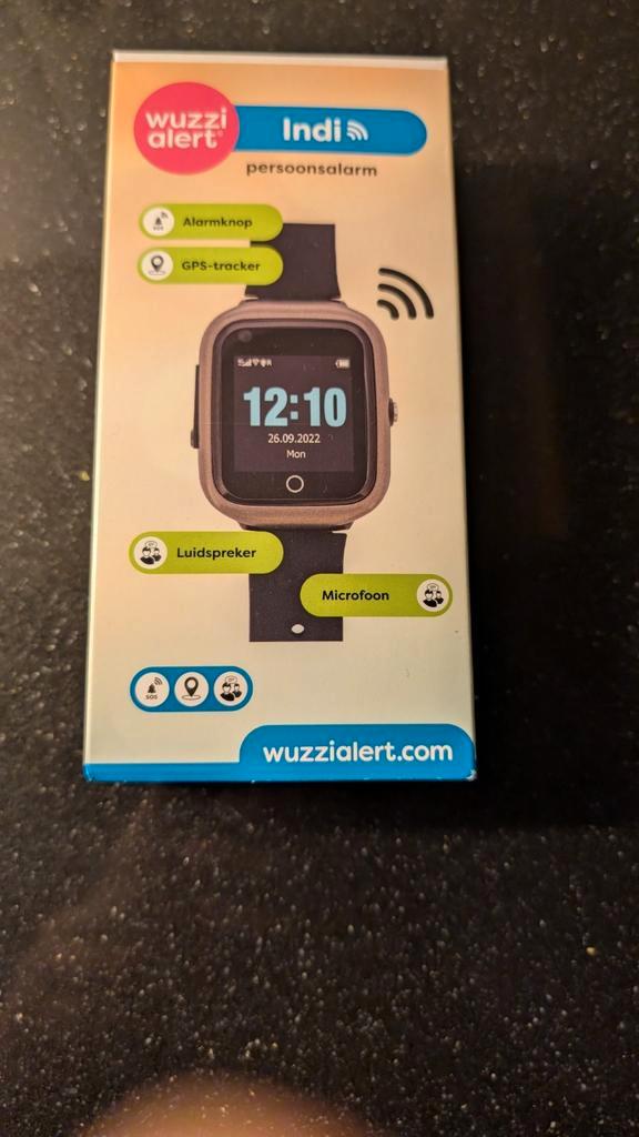Persoonsalarm / horloge Wuzzi Alert Indi II met garantie, Diversen, Verpleegmiddelen, Gebruikt, Ophalen of Verzenden