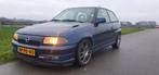 Opel Astra 2.0 GSI 16V E2 1994 Blauw, Auto's, Voorwielaandrijving, 1998 cc, Zwart, 4 cilinders