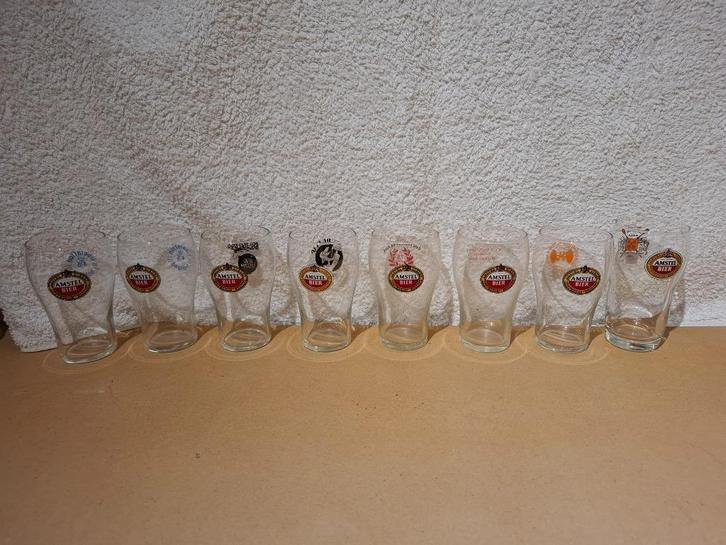 amstel dubbeldruk glazen deel 4, Verzamelen, Glas en Borrelglaasjes, Gebruikt, Bierglas, Ophalen
