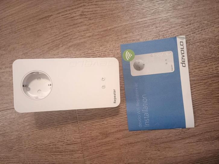 Devolo WiFi Repeater+ ac — AC1200 — 2 LAN — stopcontact, Computers en Software, WiFi-versterkers, Zo goed als nieuw, Ophalen