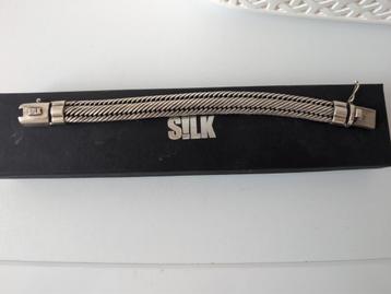Silk Armband zo goed als nieuw  beschikbaar voor biedingen
