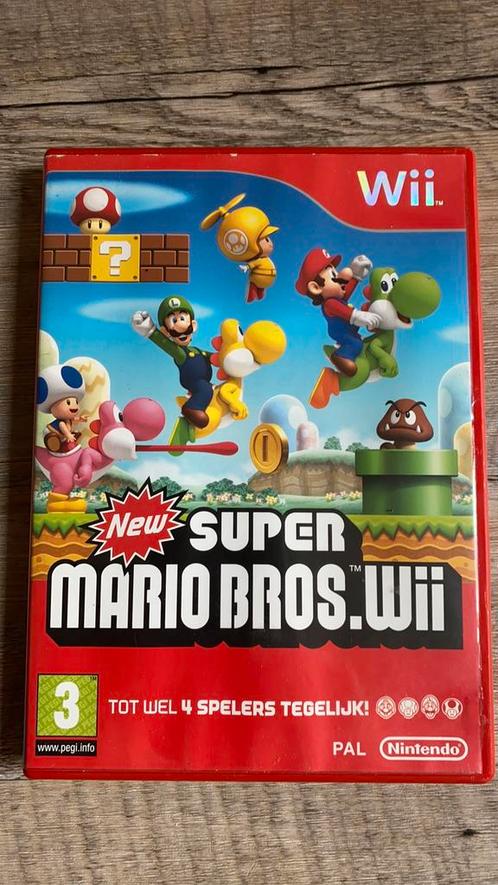 New super Mario bros compleet met handleiding, Spelcomputers en Games, Games | Nintendo Wii U, Zo goed als nieuw, Platform, 3 spelers of meer